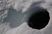 752 Neige fondue s ecoule par trou de phoque